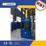 Vertical waste paper baler