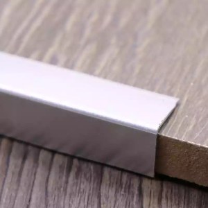 Stainless steel tile trim for marble edge