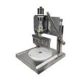 Ultrasonic hand pressure cutting machine.